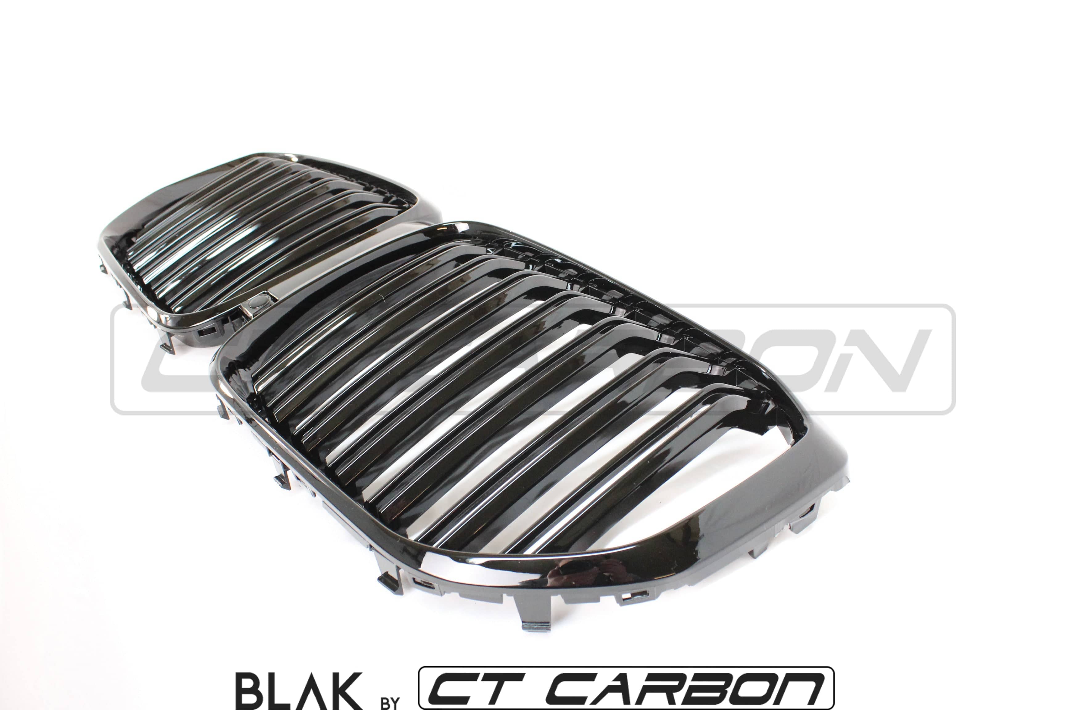 BMW X5 G05 2018+ double slat black grille by CT Carbon, showing sleek black grille with dual slats on a vehicle.