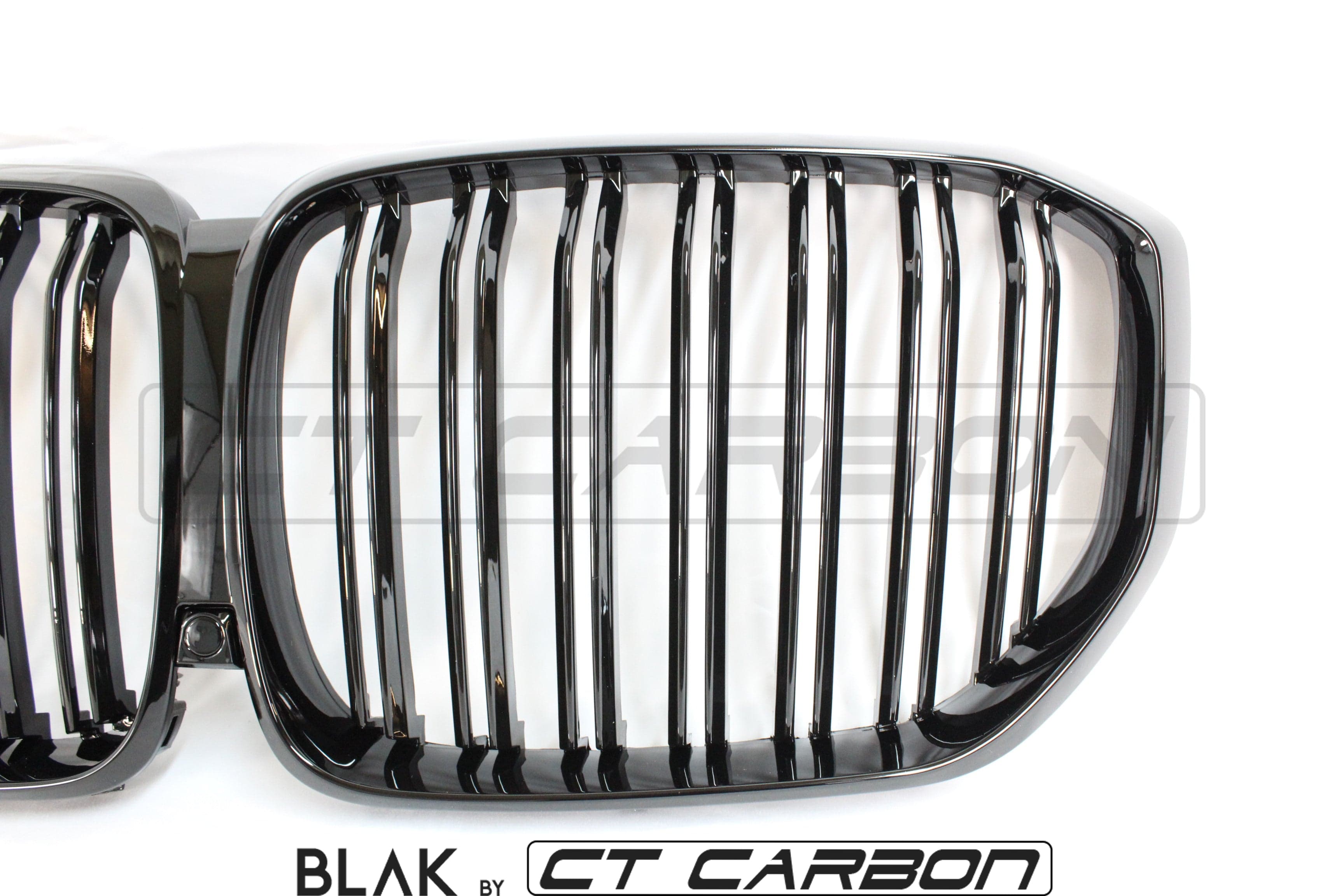 BMW X5 G05 2018+ double slat black grille by CT Carbon, showcasing sleek black grille design with multiple slats on the front of the vehicle.
