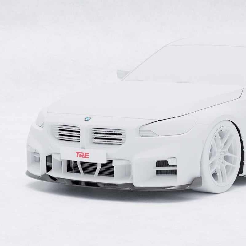 BMW G87 M2 TREVORA carbon fibre front splitter with integrated winglets, designed for enhanced aerodynamics and aggressive styling.