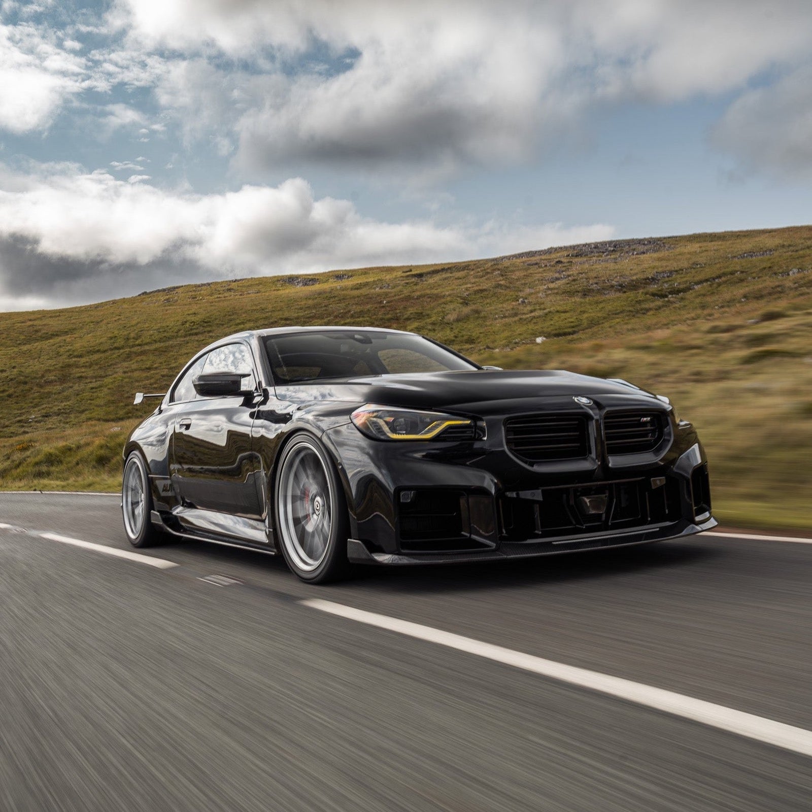 BMW G87 M2 TR87 carbon fibre side skirts by TREVORA, showcasing sleek, lightweight aerodynamic side skirts for 2023 model.
