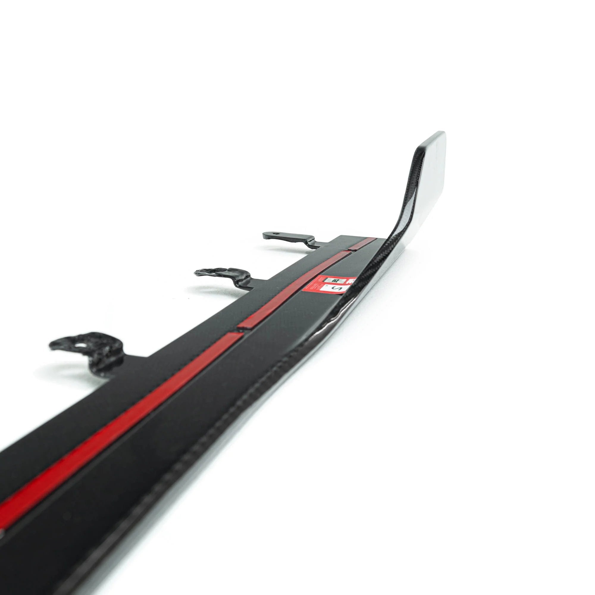 BMW G87 M2 TR87 pre-preg carbon fibre side skirts by TREVORA, showcasing sleek, lightweight aerodynamic design for 2023 model.