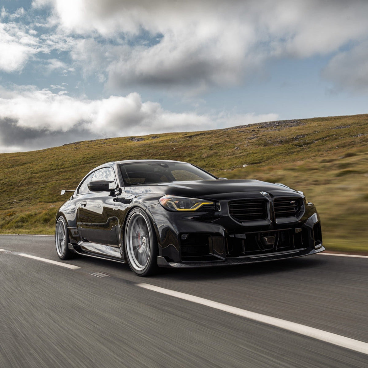 BMW G87 M2 TR87 front splitter with winglets, made of pre-preg carbon fiber, by TREVORA for 2023+ models.