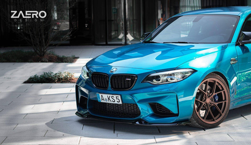BMW M2 F87 EVO-S gloss black front splitter by ZAERO, designed for 2015-2018 model, enhances aerodynamics and sporty appearance.