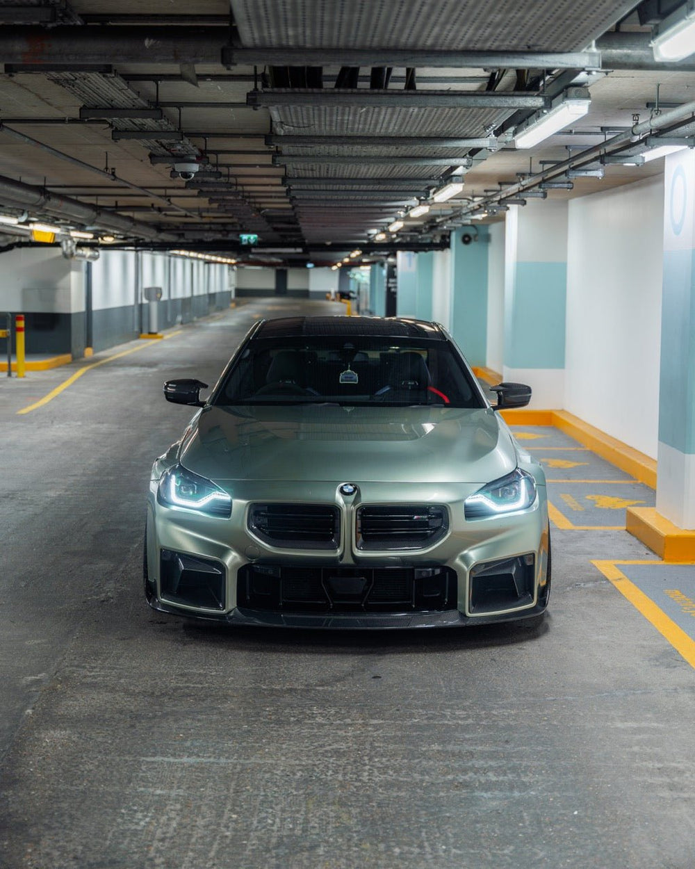 BMW M2 G87 front grille with pre-preg carbon fiber by TREVORA, showcasing sleek, lightweight design for 2023-2024 models.