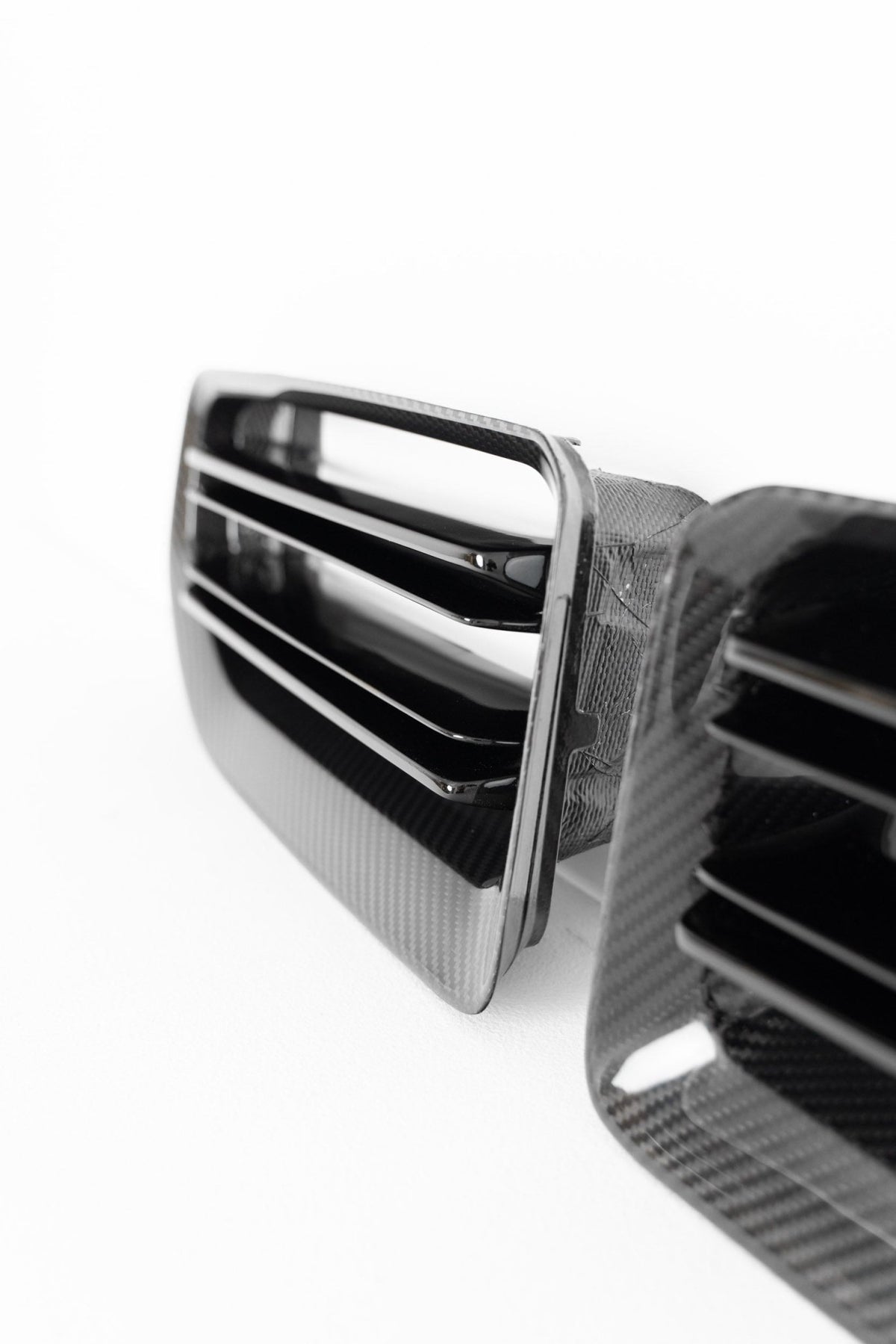 BMW M2 G87 front grill with pre-preg carbon fibre TR87 design by TREVORA, showcasing sleek, lightweight automotive grille details.