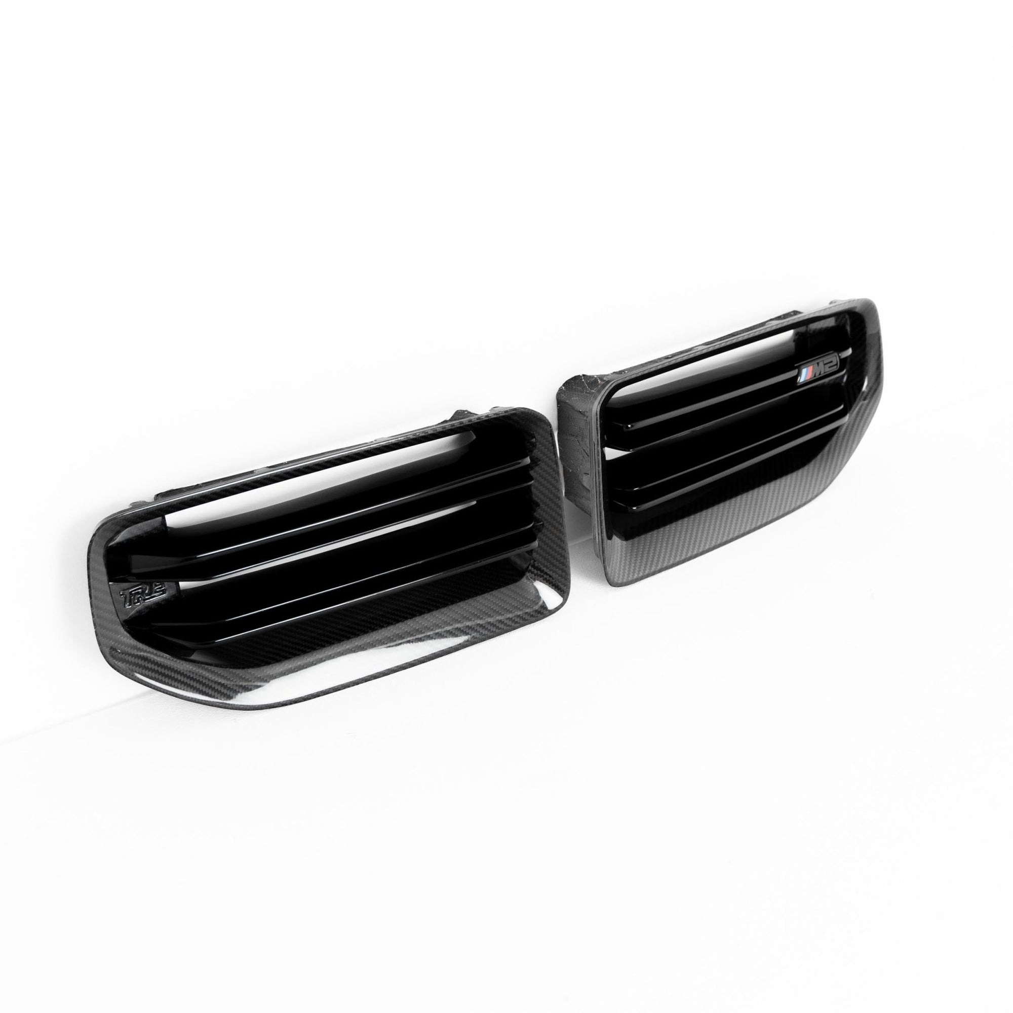 BMW M2 G87 front grille by TREVORA, made of pre-preg carbon fibre, showcasing the sleek, sporty design of the 2023-2024 model.