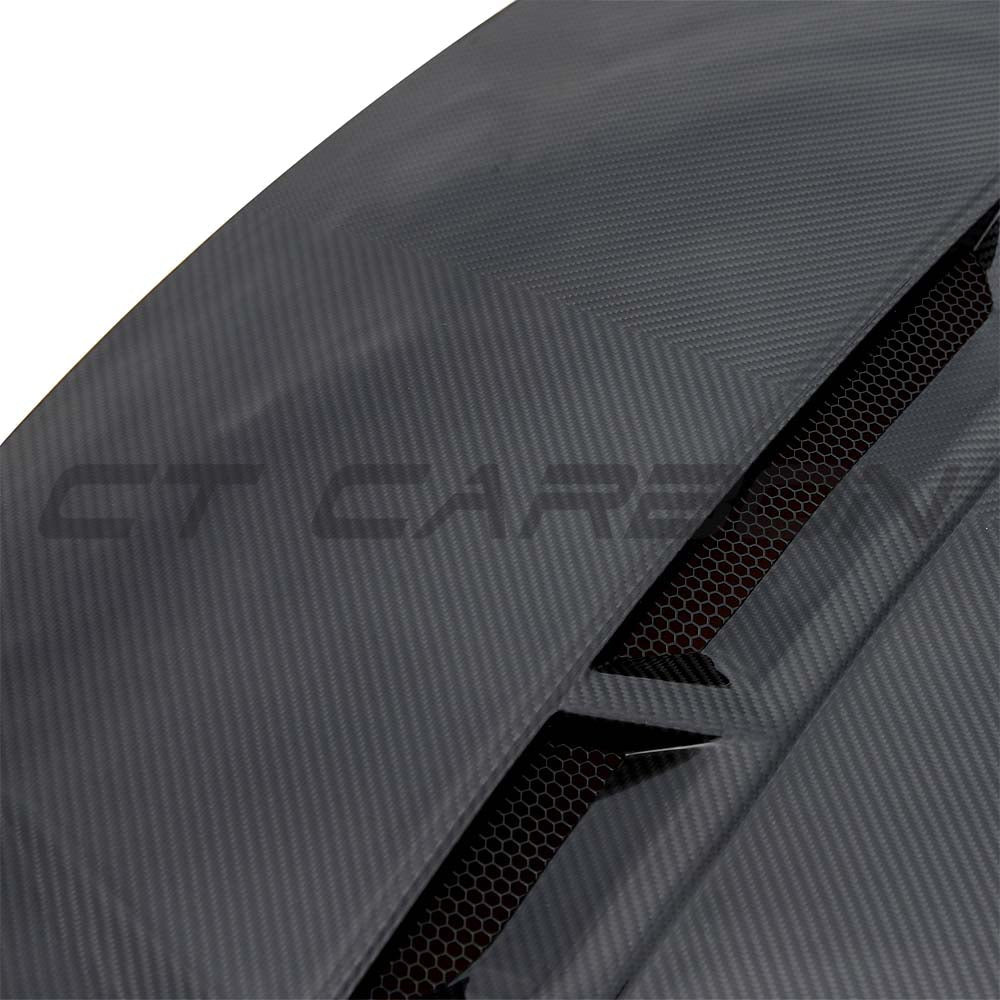 BMW G87 M2 full carbon fibre bonnet and fender kit by CT Carbon, showing the sleek lightweight front end components.