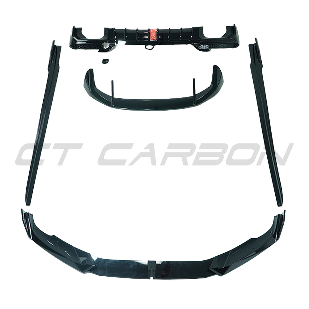 BMW X3 G01 G08 2021-2024 CT Carbon full gloss black kit with tips, showing sleek black finish and exhaust tips on the vehicle.