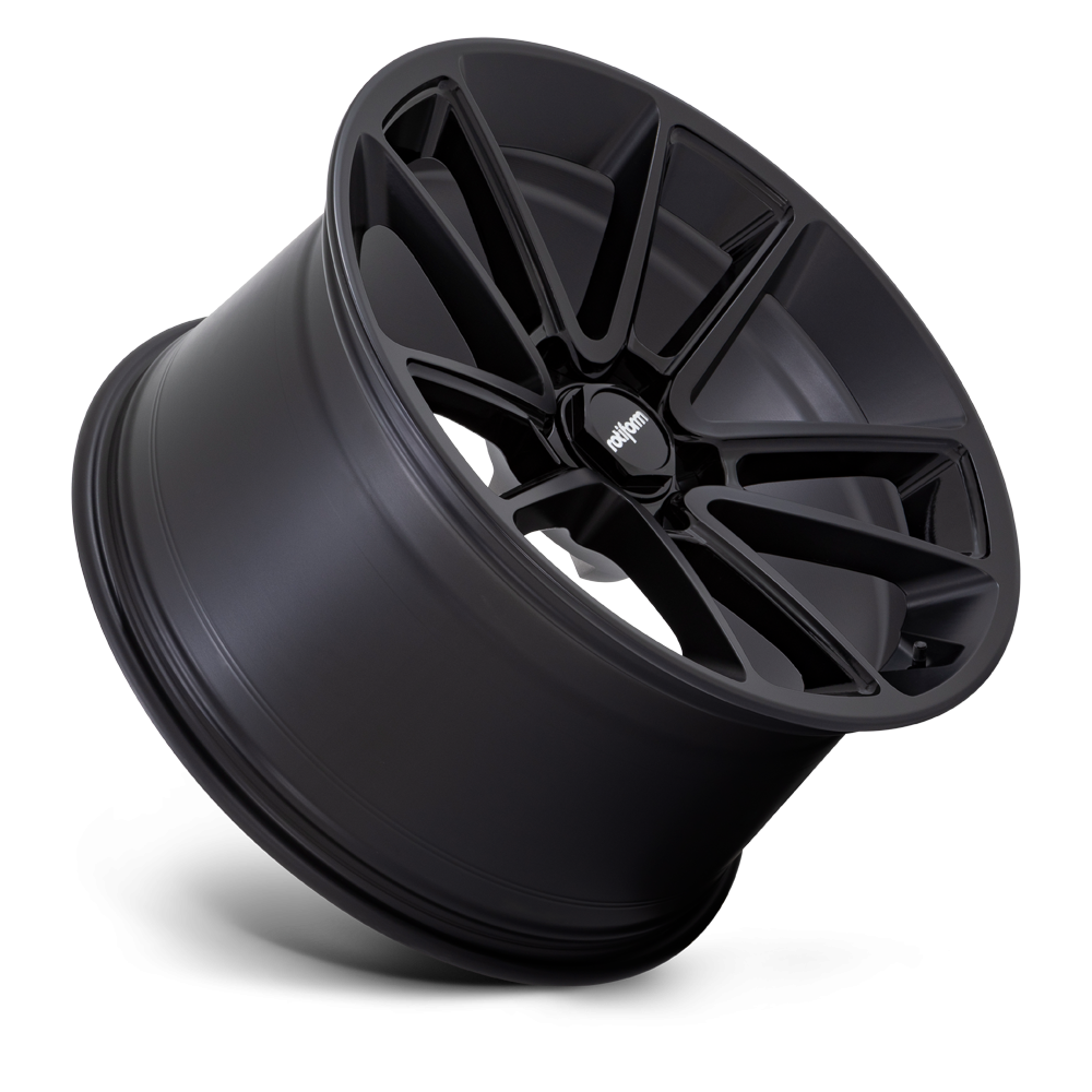 Black Rotiform BTL wheels, car alloy wheels with a sleek multi-spoke design, shown on a vehicle.
