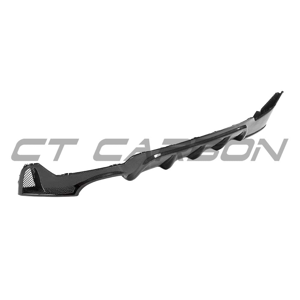 BMW F32, F33 & F36 4 Series CT Carbon diffuser with twin exhaust, showcasing carbon fiber finish and sleek design.