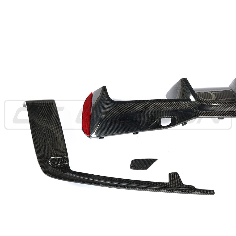 BMW F90 M5 CT Carbon V2 carbon fibre diffuser, showing a sleek 3D-style design with detailed carbon fibre texture.