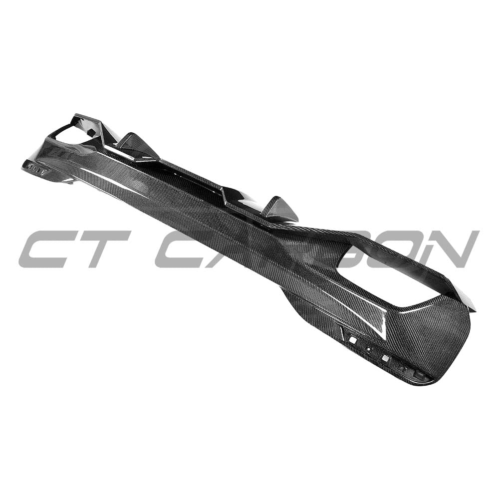 BMW G30 5 Series M Sport carbon fibre diffuser kit by CT Carbon, showing the sleek OEM-style rear diffuser with textured carbon fiber finish.