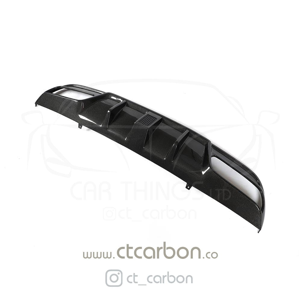Carbon diffuser for Mercedes W205 C63 and C63S saloon, by CT Design, showcasing sleek, aerodynamic design for enhanced vehicle performance.