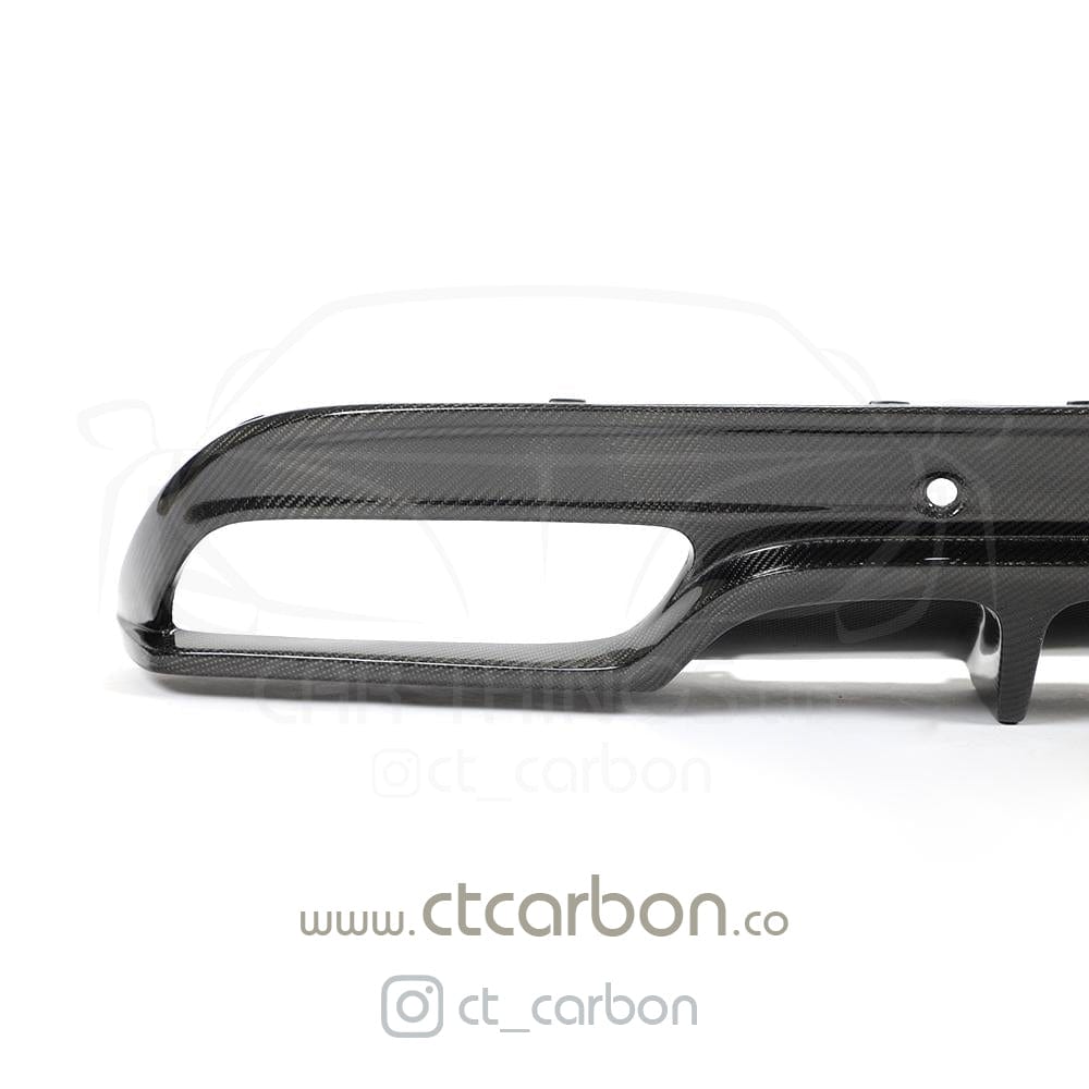 CT Carbon diffuser for Mercedes W205 C63 and C63S saloon with carbon finish and exhaust tips, designed for sporty style and performance.