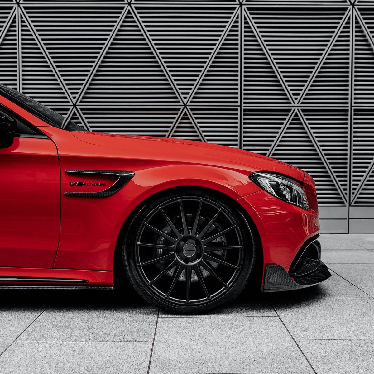 Carbon fibre wing trims for Mercedes C63/C63S W205 coupe by CT Carbon, showcasing sleek exterior styling accessories.