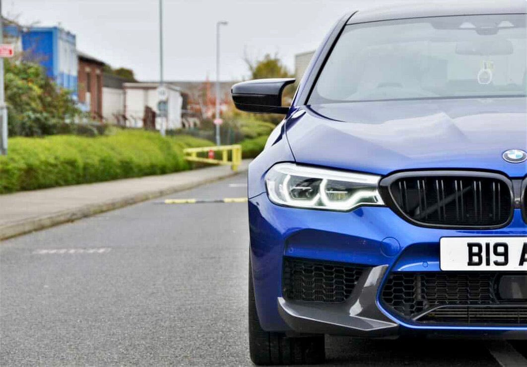 Full BMW F90 M5 saloon with CT Carbon V1 full carbon fiber kit, showcasing sleek carbon fiber exterior components.