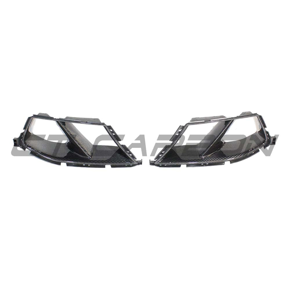 BMW M3/M4 G80/G81/G82 front end pack by CT Carbon, featuring carbon fibre bumper ducts and aerodynamic design for enhanced performance.