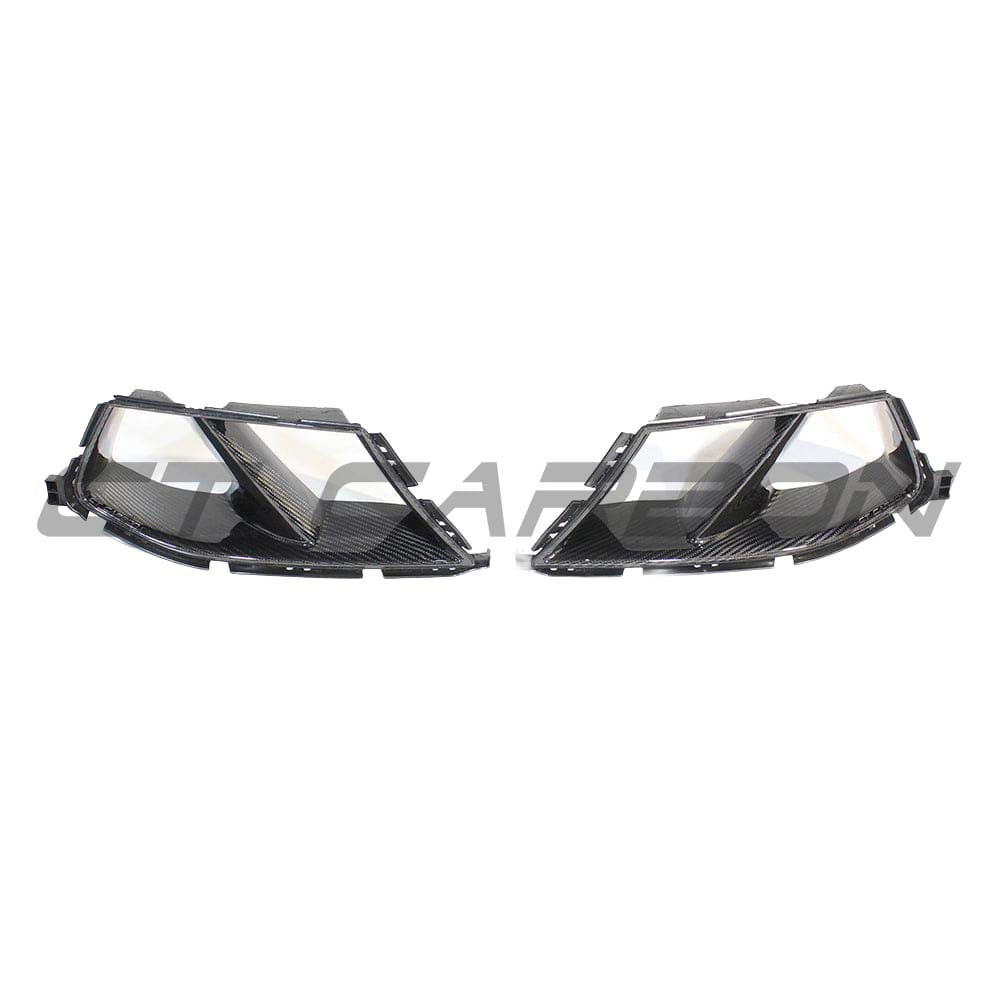 BMW M3 M4 G80 G82 G83 carbon fibre front end pack by CT Carbon, featuring bumper ducts and sporty MP-style design.