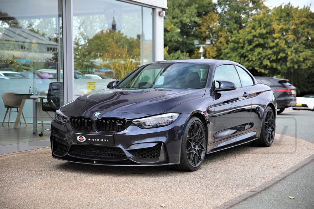 Full BMW M4 F83 convertible carbon fibre kit by CT Carbon, featuring V6 design with sleek, lightweight carbon fibre components.