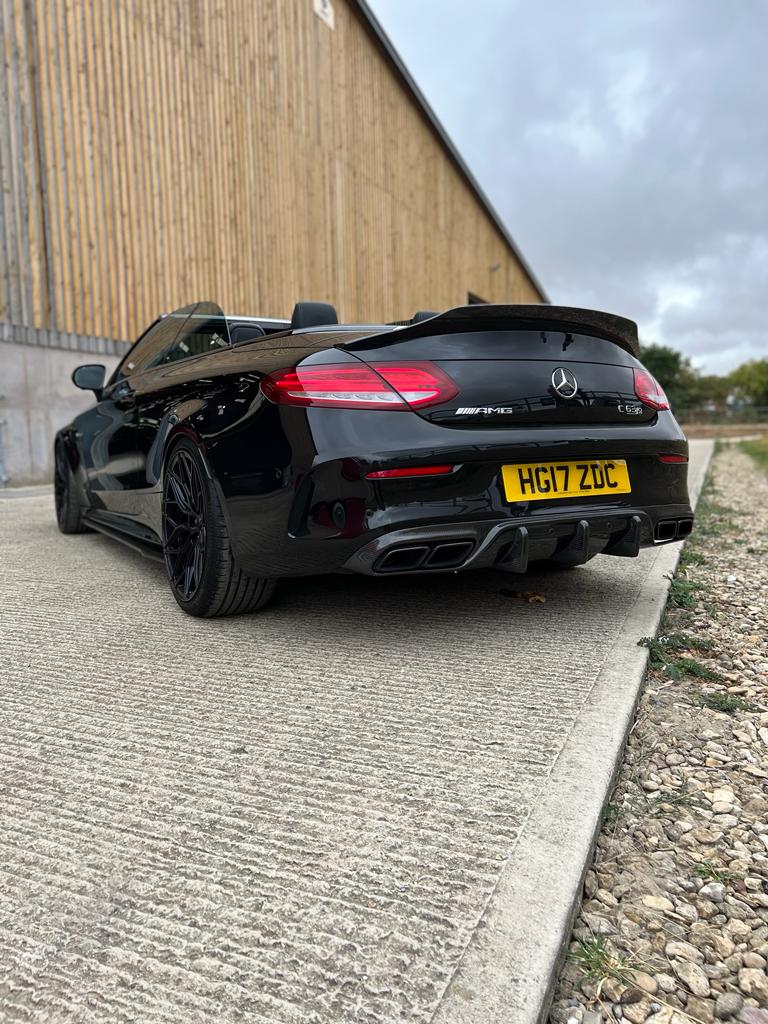 Full carbon fiber kit for Mercedes C63 W205 2015-2018 convertible by CT Carbon, showing detailed carbon fiber components and kit layout.
