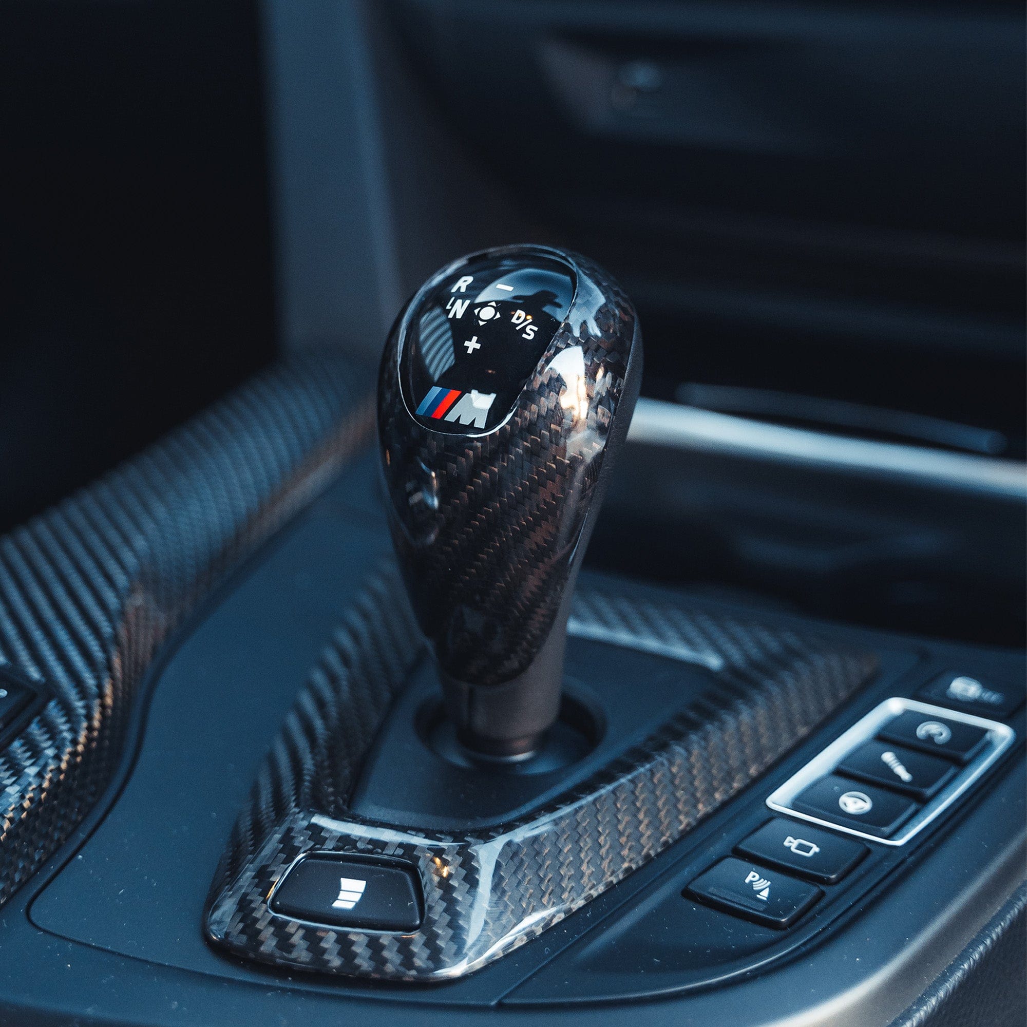 BMW Fxx M car DCT shifter and surround set by CT Carbon, RHD interior accessories with carbon fiber finish.