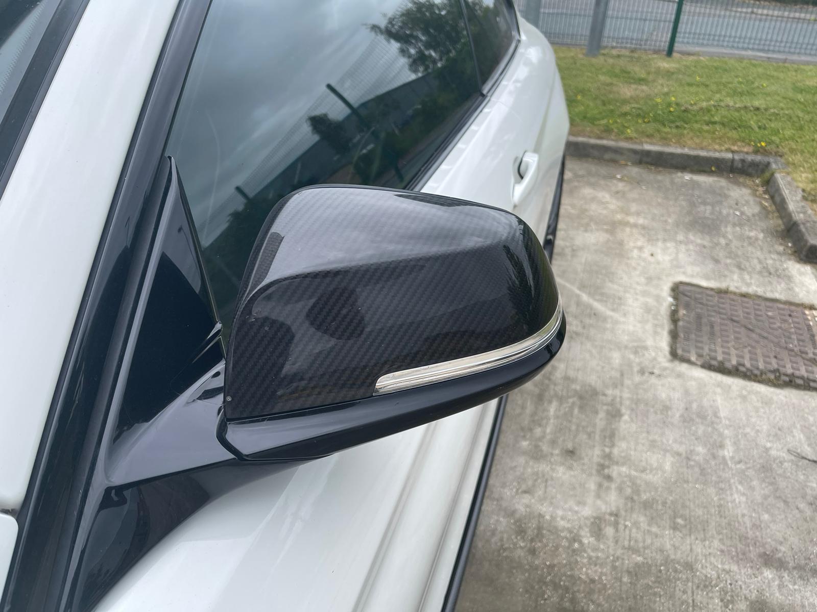 BMW Fxx series carbon mirror replacement by CT Carbon, OE-style side mirror with aerodynamic design.