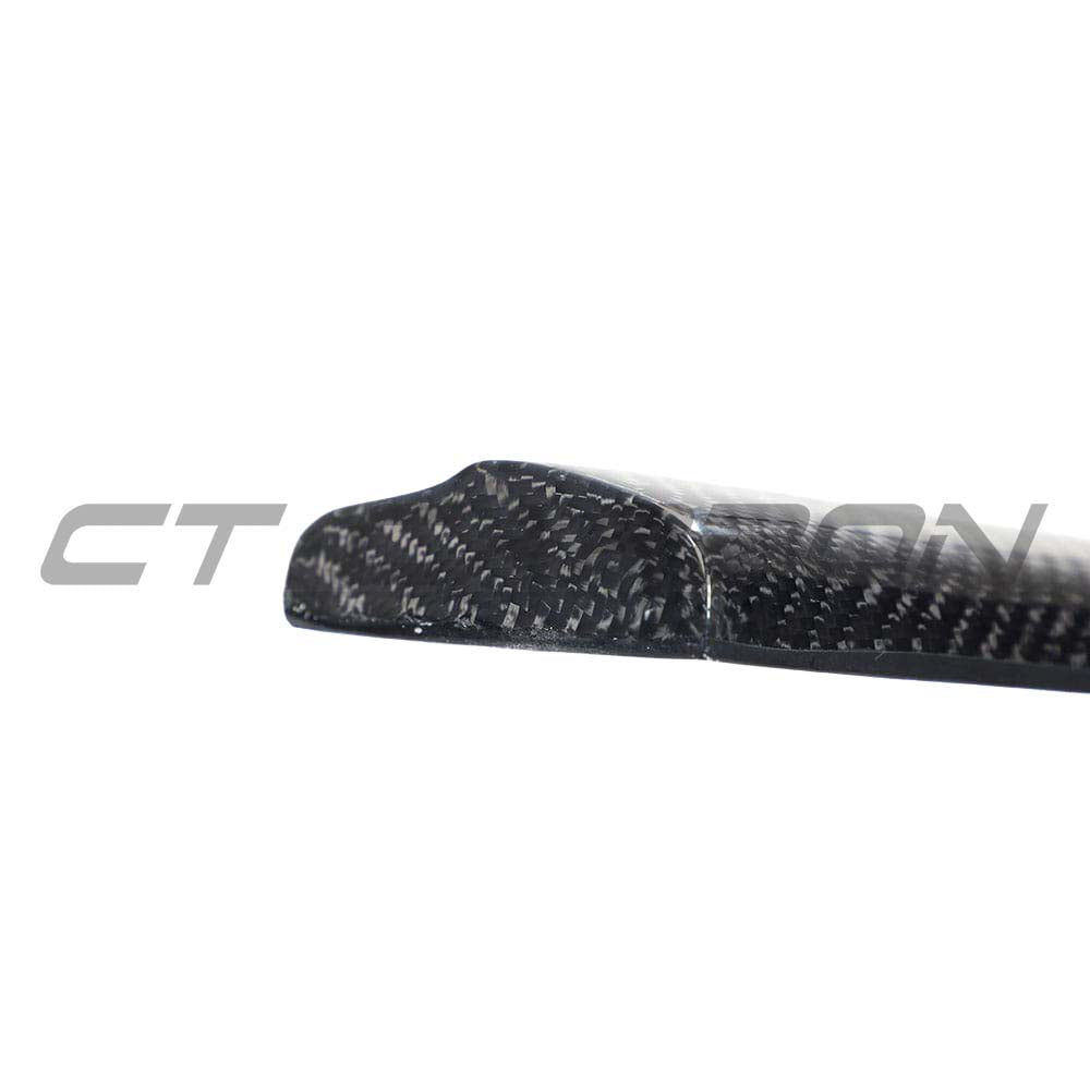 Carbon fibre side skirts for Audi A3/S3/RS3 8V saloon from CT Carbon, showing sleek, aerodynamic design and textured finish.