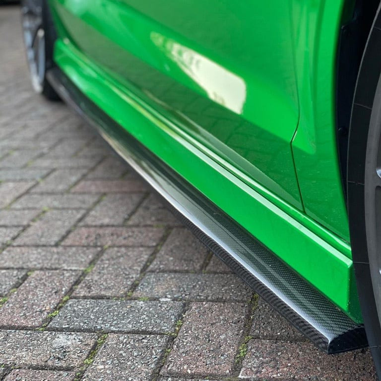 CT Carbon carbon fiber side skirts for Audi A3/S3/RS3 8V saloon, sleek aerodynamic enhancements with a carbon fiber finish.