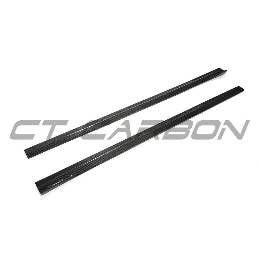 BMW F87 M2 2016-2018 CT Carbon full carbon fiber side skirts installed on the vehicle, showcasing 3D-style design.
