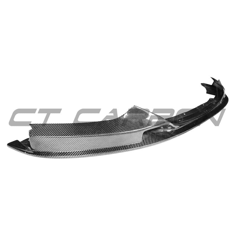 BMW F22 2 Series 2014-2020 CT Carbon full carbon fiber front lip splitter installed on the vehicle, showcasing a sporty, aerodynamic design.
