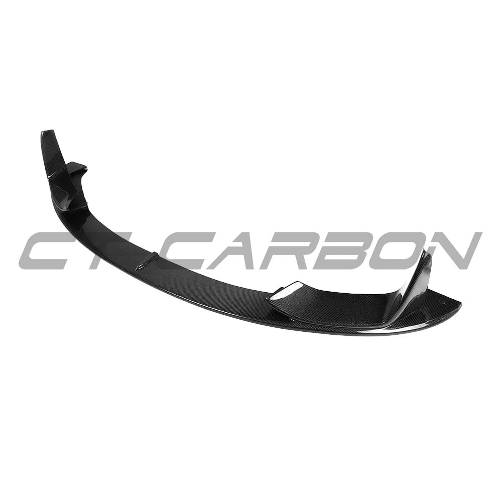 BMW M3 F80 full carbon fibre kit by CT Carbon, includes splitter and body parts, showcasing sleek carbon fibre details.