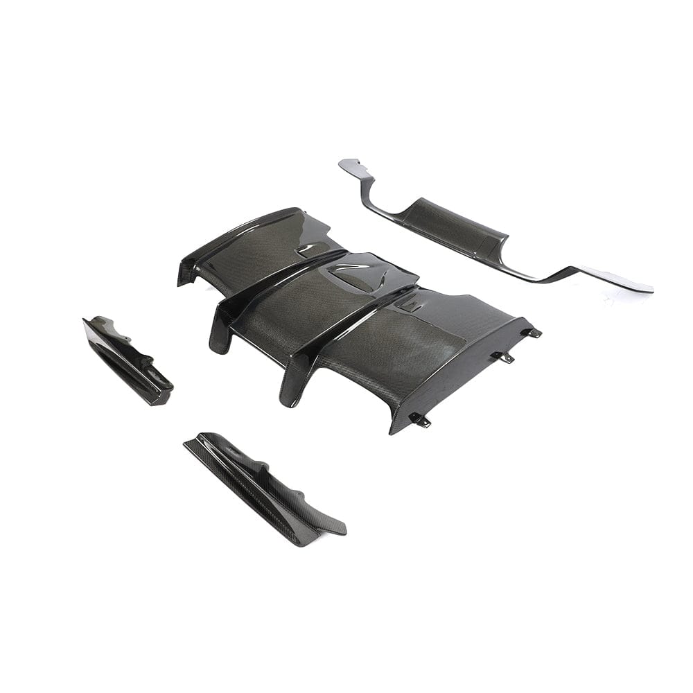 BMW M3 M4 F80 F82 F83 carbon fibre diffuser by CT Carbon, showcasing its sleek design and lightweight carbon fiber construction.