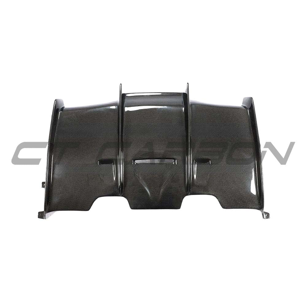 BMW M3 M4 F80 F82 F83 carbon fibre diffuser by CT Carbon, showcasing sleek, lightweight automotive rear diffuser with detailed texture.
