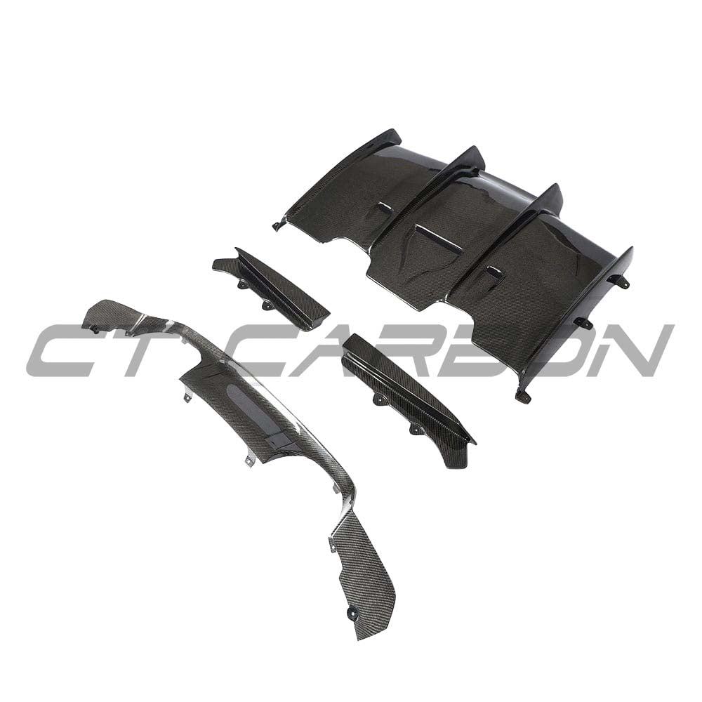 BMW M3 M4 F80 F82 F83 carbon fibre diffuser by CT Carbon, showcasing sleek split design and high-quality carbon fiber finish.