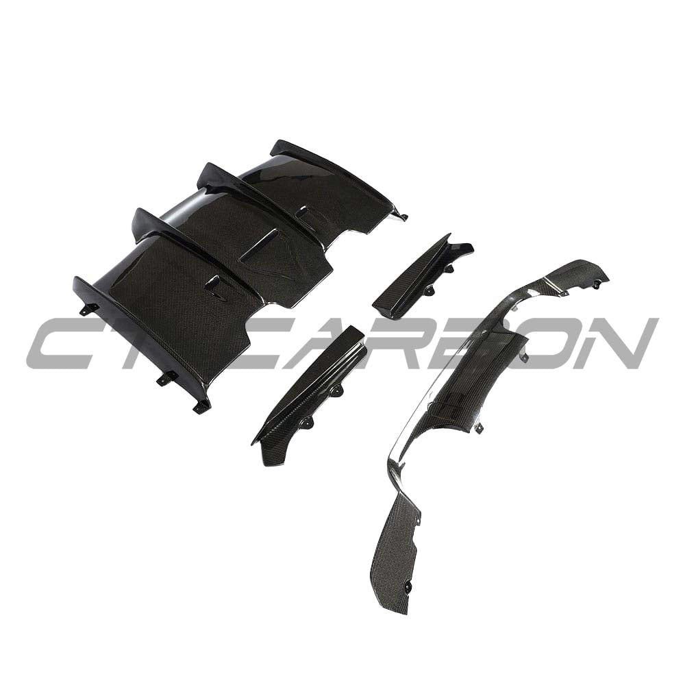 BMW M3 M4 F80 F82 F83 carbon fiber diffuser by CT Carbon, showing sleek PS-style design and high-quality lightweight construction.