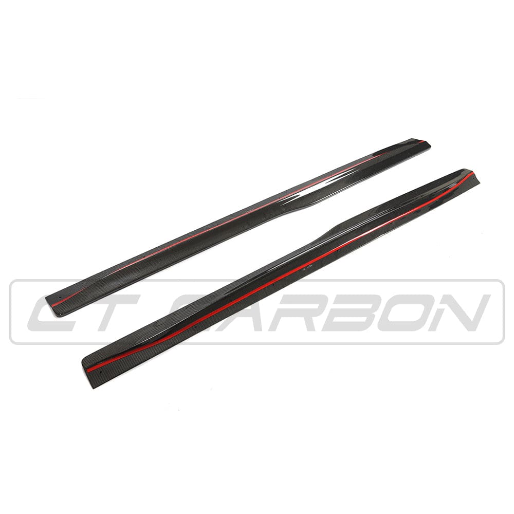 BMW M4 F82 F83 carbon fibre side skirts by CT Carbon, featuring PS style design, installed on the side of the sporty coupe.