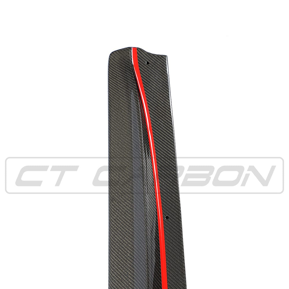 BMW M4 F82 F83 carbon fibre side skirts by CT Carbon, featuring PS style design, installed on the vehicle's sides.
