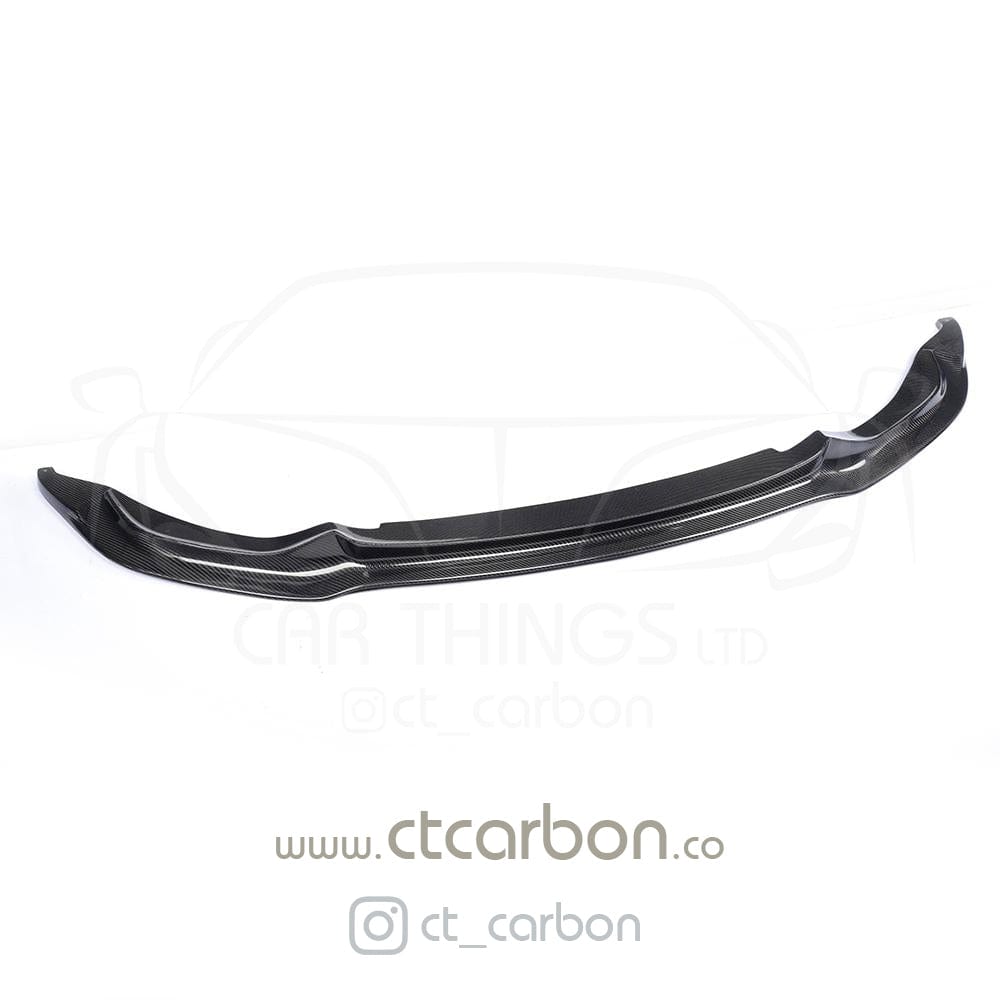 Full BMW M4 F83 convertible carbon fiber kit by CT Carbon, featuring splitter and V-style body components, in high-quality carbon fiber.