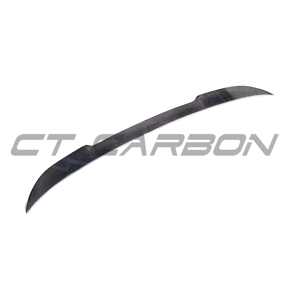 BMW G30 5 Series carbon fibre kit by CT Carbon, featuring splitter and spoiler with a sleek carbon fibre finish.