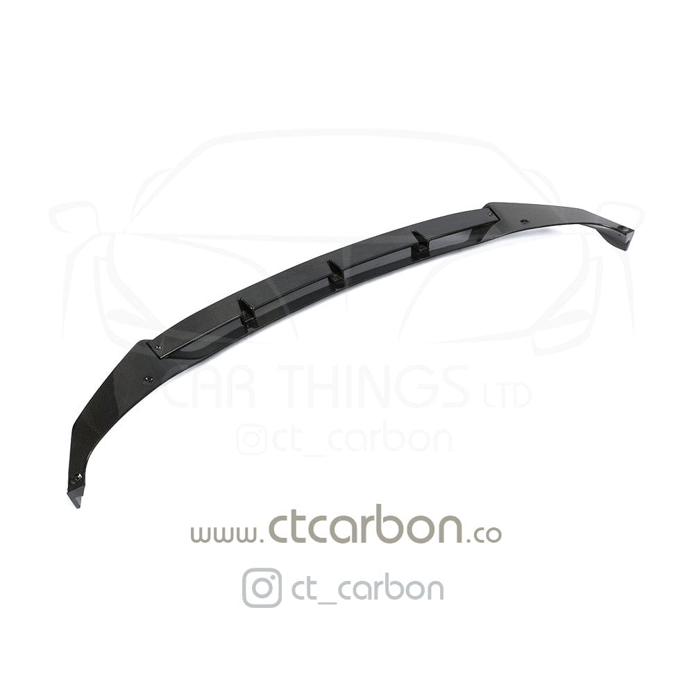 BMW X5 G05 CT Design carbon fibre splitter, lightweight aerodynamic car accessory with textured carbon finish.