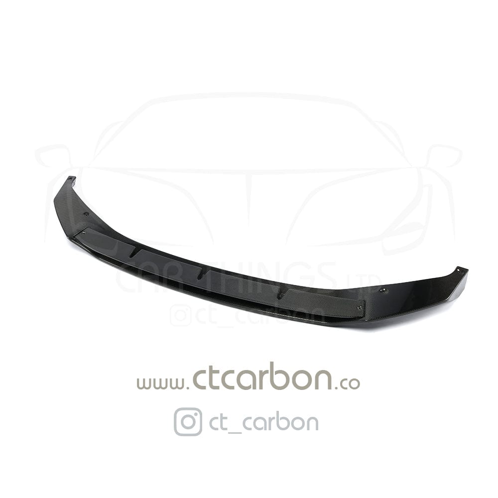 BMW X5 G05 carbon fibre splitter by CT Design, showcasing sleek, aerodynamic car accessory with textured carbon fibre finish.