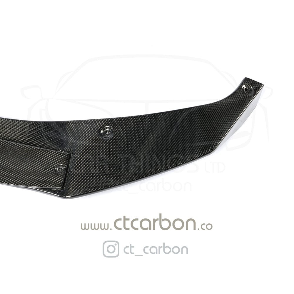 BMW X5 G05 CT Design carbon fiber splitter showing sleek, lightweight automotive front splitter with textured carbon fiber finish.