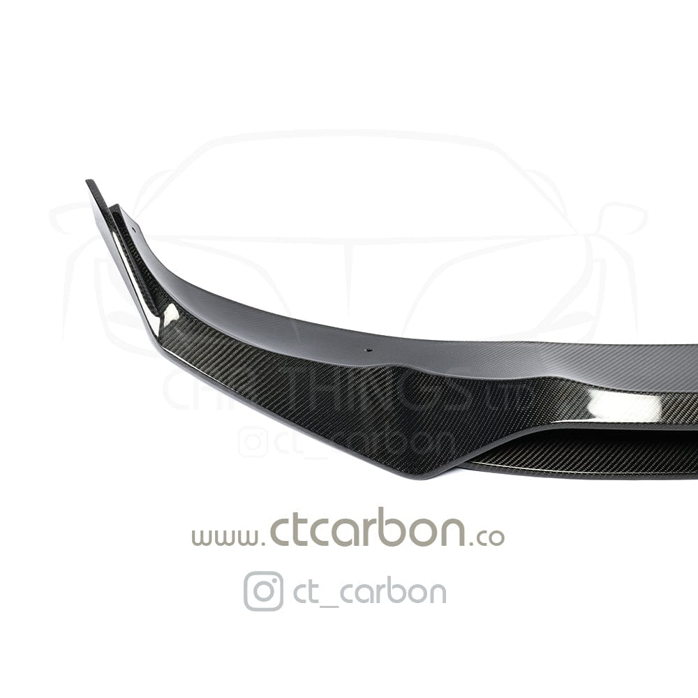BMW X5 G05 CT Design carbon fibre splitter, lightweight car accessory enhancing aerodynamics and sporty look.