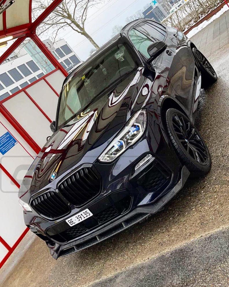 BMW X5 G05 CT Design carbon fibre splitter showing sleek black finish and aerodynamic design for enhanced vehicle performance.