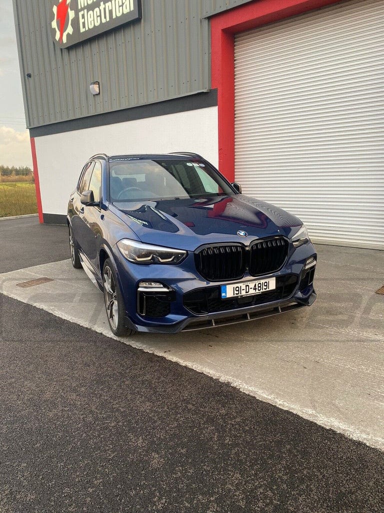 BMW X5 G05 CT Design carbon fibre splitter, front car accessory, showcasing sleek carbon fibre finish and aerodynamic design.