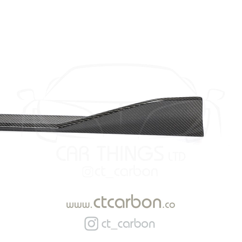 Full view of the CT Carbon Toyota Supra A90 2019+ full carbon fibre kit, featuring a splitter and aerodynamic components.