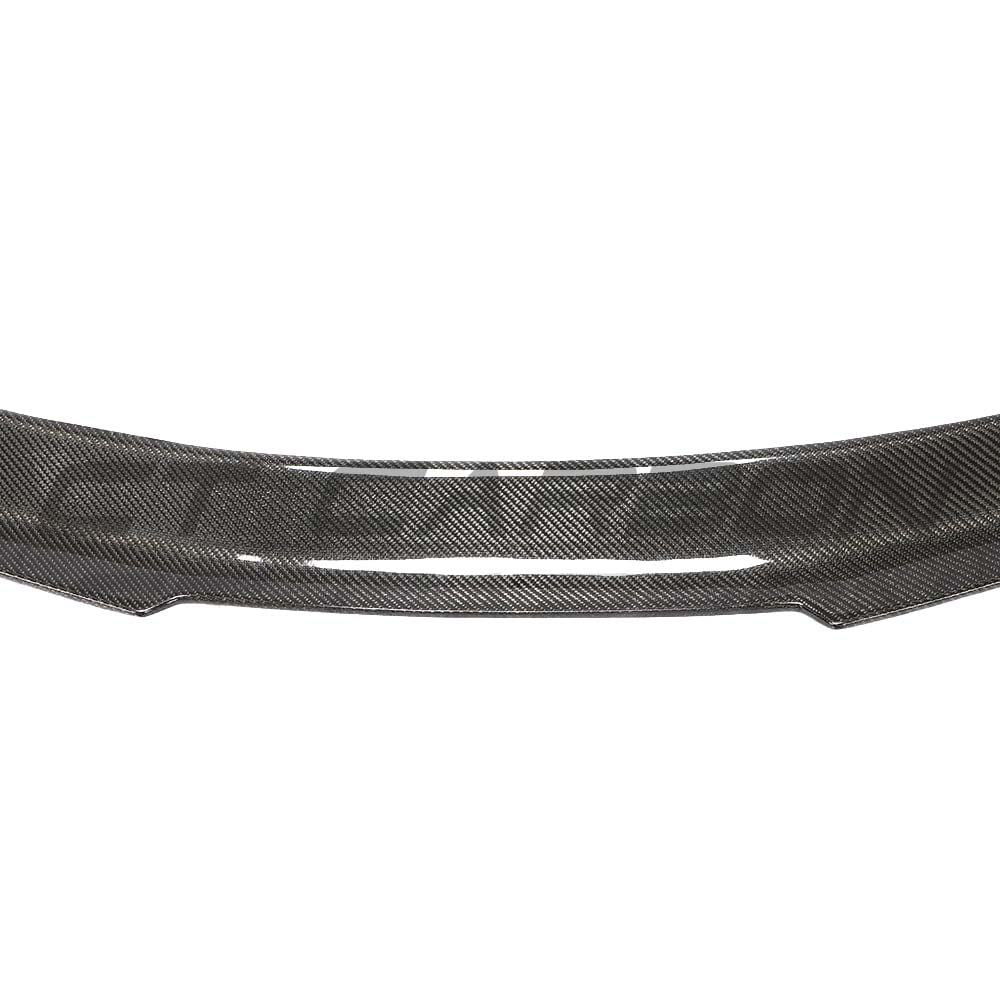 Carbon fibre spoiler for Audi A5/S5 B9 coupe by CT Carbon, showcasing sleek design and textured finish on the vehicle's rear.