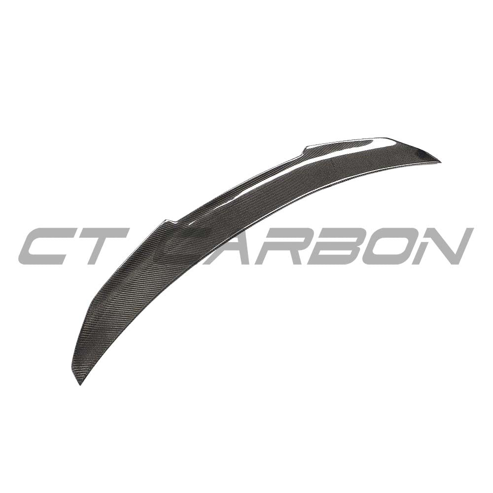 Close-up of CT Carbon fiber spoiler for Audi A5/S5 B9 coupe, showcasing sleek carbon fiber finish and aerodynamic design.
