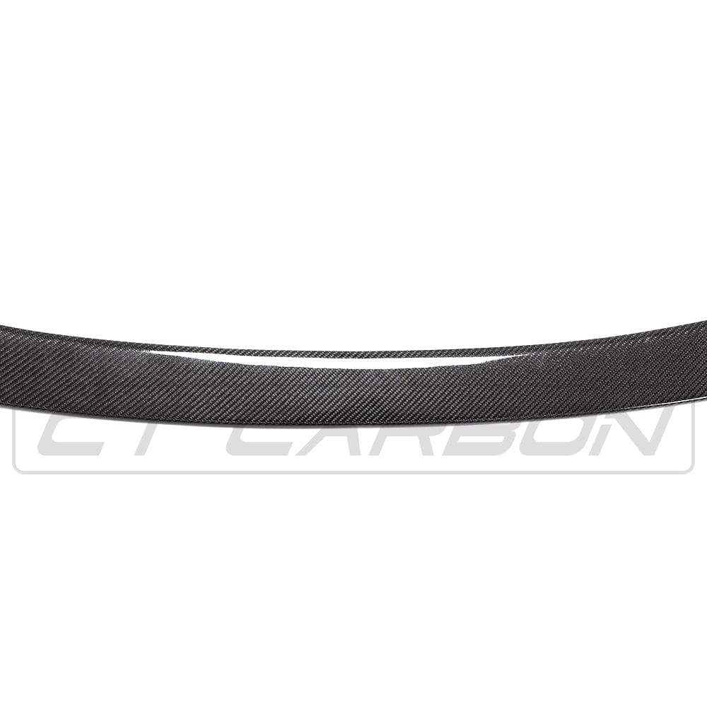 BMW F10 M5 and 5 Series carbon fibre spoiler by CT Carbon, V-style, showcasing sleek, lightweight aerodynamic design.