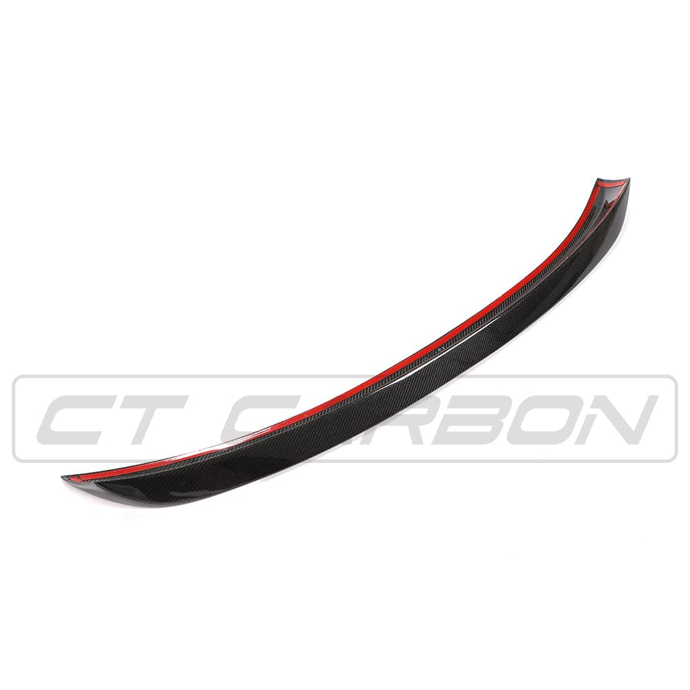 BMW F10 M5 carbon fibre spoiler by CT Carbon, V-style design, shown on the car's rear for enhanced aerodynamics.